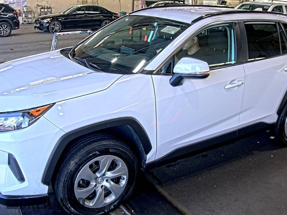 2019 Toyota RAV4 LE with VIN 2T3G1RFV5KC047821, listed as a IAAI auction lot 42820690 with 68,742 mi miles and . Bid and sale history available at DreamBid. Image 1.