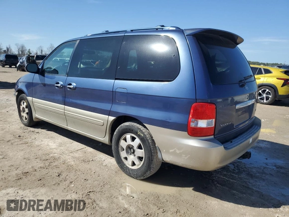2003 Kia Sedona LX with VIN KNDUP131736409797, listed as a Copart auction lot 46902855 with 142,091 mi miles and Salvage Title. Bid and sale history available at carsss.com. Image 2.