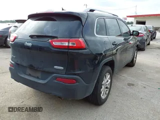 2014 Jeep Cherokee Latitude with VIN 1C4PJMCS5EW294743, listed as a IAAI auction lot 42098992 with 185,814 mi miles. Bid and sale history available at carsss.com. Image 4.
