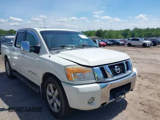 2010 Nissan Titan SE with VIN 1N6BA0ED4AN323907, listed as a IAAI auction lot 42113512 with 198,530 mi miles. Bid and sale history available at carsss.com. Image 1.