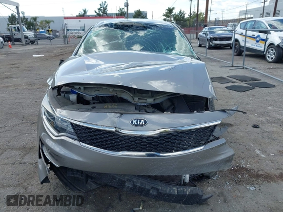 2018 Kia Optima LX z VIN 5XXGT4L38JG228380, wystawiony jako IAAI lot #41960308 z przebiegiem 43 317 mil mil oraz . Historia ofert i sprzedaży dostępna na DreamBid. Obrazek 6.