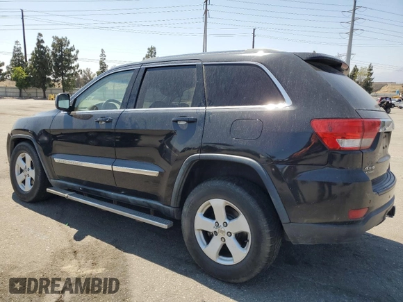 2011 Jeep Grand Cherokee Laredo with VIN 1J4RR4GG0BC563603, listed as a Copart auction lot 60237475 with 243,885 mi miles and Salvage title. Bid and sale history available at DreamBid. Image 2.