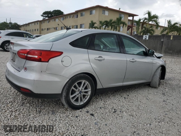 2018 Ford Focus SE with VIN 1FADP3F28JL256318, listed as a Copart auction lot 55524544 with 136,723 mi miles and Salvage title. Bid and sale history available at DreamBid. Image 3.