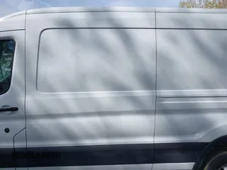 2021 Ford Transit Cargo with VIN 1FTBR1C85MKA48173, listed as a IAAI auction lot 42005472 with 81,980 mi miles and . Bid and sale history available at DreamBid. Image 14.
