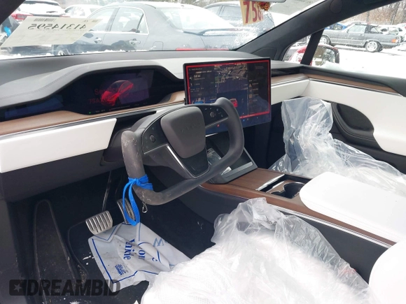 2023 Tesla Model X with VIN 7SAXCBE51PF404297, listed as a IAAI auction lot 41314595 with 25,020 mi miles and . Bid and sale history available at DreamBid. Image 5.
