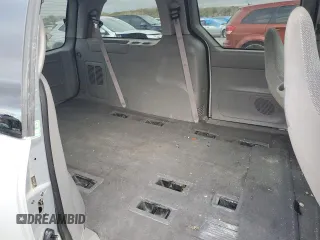 2003 Ford Windstar LX z VIN 2FMZA51433BA70321, wystawiony jako Copart lot #77114094 z przebiegiem 125 267 mil mil oraz Szkoda całkowita • Salvage title. Historia ofert i sprzedaży dostępna na DreamBid. Obrazek 11.