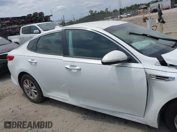 2018 Kia Optima S with VIN 5XXGT4L3XJG244516, listed as a IAAI auction lot 42136414 with 96,000 mi miles and . Bid and sale history available at DreamBid. Image 13.