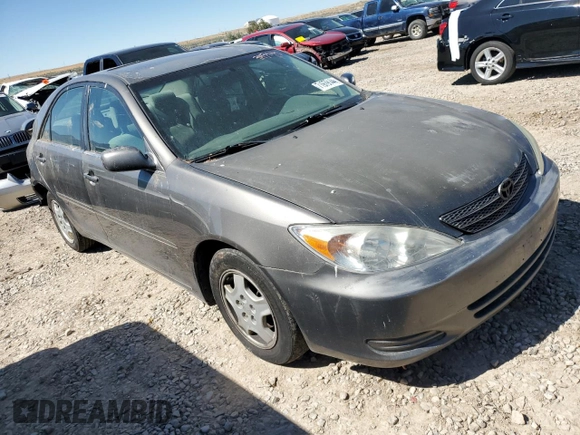 2003 Toyota Camry LE z VIN 4T1BF32K93U566965, wystawiony jako Copart lot #71979144 z przebiegiem 267 228 mil mil oraz Szkoda całkowita • Salvage title. Historia ofert i sprzedaży dostępna na DreamBid. Obrazek 4.