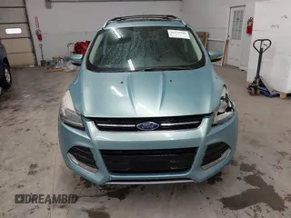 2013 Ford Escape Titanium with VIN 1FMCU9J9XDUC60029, listed as a IAAI auction lot 41936948 with 184,012 mi miles and . Bid and sale history available at DreamBid. Image 12.