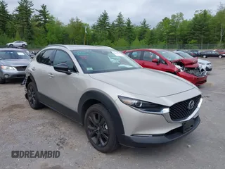 2023 Mazda CX-30 Premium с VIN 3MVDMBDY7PM566311, выставлен на аукционе IAAI как лот 42299581 с пробегом 7 702 миль миль и . История ставок и продаж доступна на DreamBid. Изображение 1.