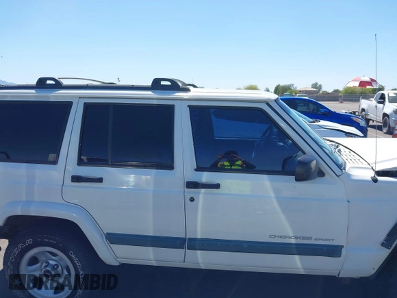 2000 Jeep Cherokee z VIN 1J4FF48S3YL236054, wystawiony jako IAAI lot #42217775 z przebiegiem 192 826 mil mil oraz . Historia ofert i sprzedaży dostępna na DreamBid. Obrazek 13.