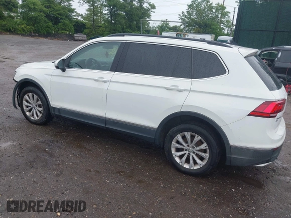 2018 Volkswagen Tiguan SEL with VIN 3VV2B7AX6JM059173, listed as a IAAI auction lot 42461175 with 86,679 mi miles and . Bid and sale history available at DreamBid. Image 3.