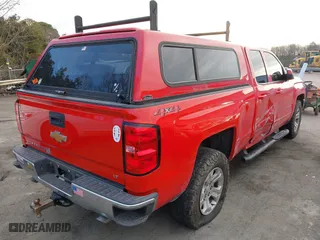 2018 Chevrolet Silverado 1500 LT with VIN 1GCVKREC3JZ170745, listed as a IAAI auction lot 41590416 with 124,577 mi miles. Bid and sale history available at carsss.com. Image 4.