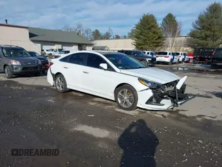 2018 Hyundai Sonata SEL z VIN 5NPE34AF2JH663887, wystawiony jako IAAI lot #41694863 z przebiegiem 101 989 mil mil oraz . Historia ofert i sprzedaży dostępna na DreamBid. Obrazek 1.
