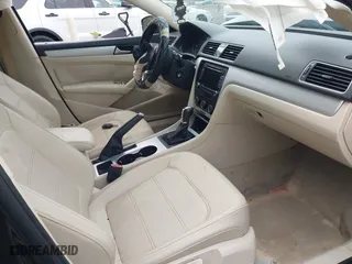 2013 Volkswagen Passat SE w/Sunroof with VIN 1VWBH7A33DC150043, listed as a IAAI auction lot 41411518 with 132,208 mi miles. Bid and sale history available at carsss.com. Image 5.