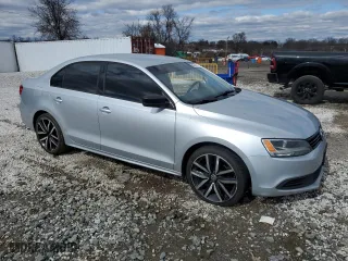 2013 Volkswagen Jetta Sedan with VIN 3VW2K7AJ8DM309217, listed as a Copart auction lot 49316175 with 124,528 mi miles and Salvage Title. Bid and sale history available at carsss.com. Image 4.