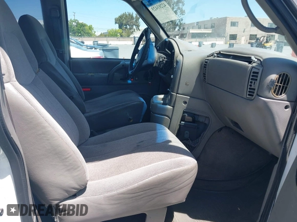 2003 Chevrolet Astro with VIN 1GNDM19X13B110549, listed as a IAAI auction lot 42203425 with 157,835 mi miles. Bid and sale history available at carsss.com. Image 5.