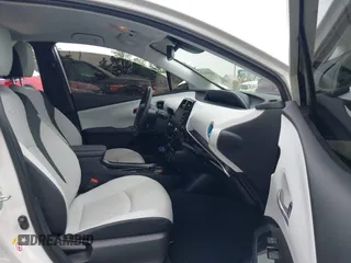 2021 Toyota Prius L Eco with VIN JTDKAMFU6M3137679, listed as a IAAI auction lot 42488129 with 52,414 mi miles and . Bid and sale history available at DreamBid. Image 5.