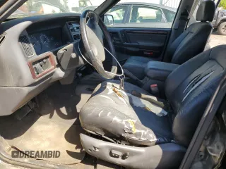 1998 Jeep Grand Cherokee Laredo with VIN 1J4GZ58Y4WC109610, listed as a Copart auction lot 58705124 with 247,990 mi miles and Salvage Title. Bid and sale history available at carsss.com. Image 7.