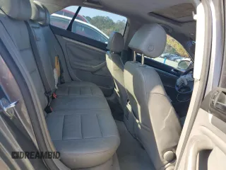 2006 Volkswagen Jetta z VIN 3VWDG71K26M673879, wystawiony jako Copart lot #75674634 z przebiegiem 93 689 mil mil oraz Szkoda całkowita • Salvage title. Historia ofert i sprzedaży dostępna na DreamBid. Obrazek 10.