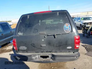 1999 Ford Expedition XLT z VIN 1FMRU1760XLB99695, wystawiony jako IAAI lot #41396676 z przebiegiem 214 434 mil mil oraz . Historia ofert i sprzedaży dostępna na DreamBid. Obrazek 16.