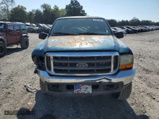2000 Ford Super Duty F-250 XL with VIN 1FTNX21L0YED10993, listed as a Copart auction lot 74277164 with 329,899 mi miles and Salvage Title. Bid and sale history available at carsss.com. Image 5.