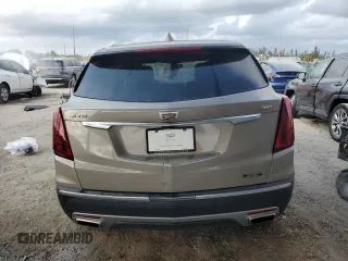 2022 Cadillac XT5 FWD Premium Luxury z VIN 1GYKNCRS4NZ179429, wystawiony jako Copart lot #47180195 z przebiegiem 45 649 mil mil oraz Nie do naprawy • Non repairable. Historia ofert i sprzedaży dostępna na DreamBid. Obrazek 6.