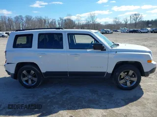2015 Jeep Patriot High Altitude with VIN 1C4NJRFB8FD270157, listed as a IAAI auction lot 41634010 with 87,662 mi miles and . Bid and sale history available at carsss.com. Image 13.