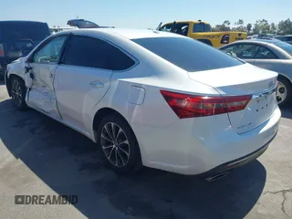 2016 Toyota Avalon Limited with VIN 4T1BK1EB4GU216774, listed as a IAAI auction lot 41861690 with 113,153 mi miles and . Bid and sale history available at carsss.com. Image 3.
