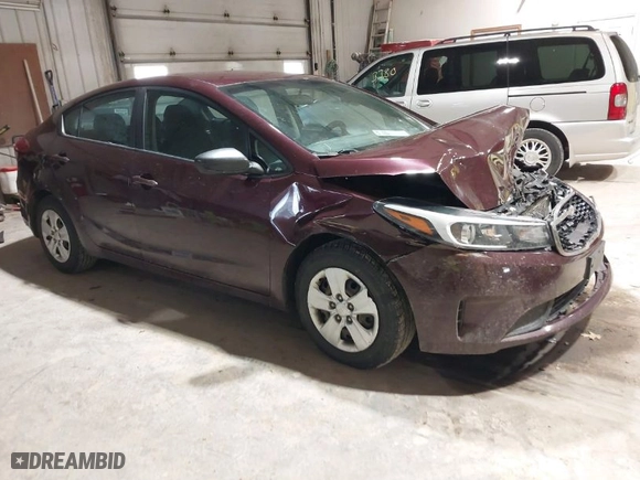 2017 Kia Forte LX with VIN 3KPFK4A78HE129551, listed as a IAAI auction lot 41926331 with 124,285 mi miles. Bid and sale history available at carsss.com. Image 1.