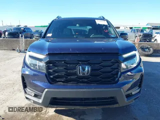 2023 Honda Passport Elite with VIN 5FNYF8H06PB012234, listed as a IAAI auction lot 41208146 with 38,491 mi miles and . Bid and sale history available at DreamBid. Image 12.