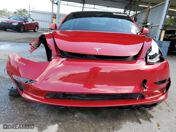 2023 Tesla Model 3 with VIN 5YJ3E1EA9PF447427, listed as a Copart auction lot 51603385 with 99,593 mi miles and Non Repairable. Bid and sale history available at carsss.com. Image 5.