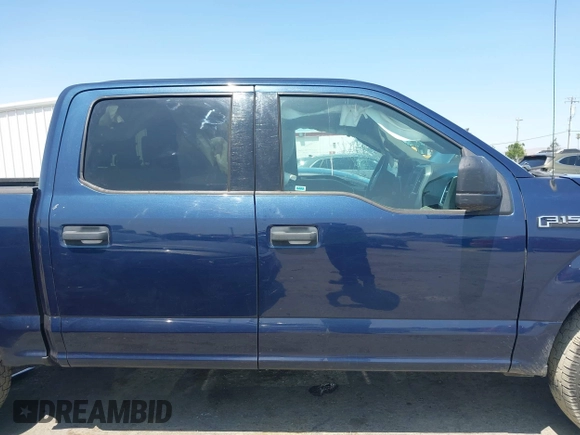 2015 Ford F-150 XLT with VIN 1FTEW1EF8FFA41487, listed as a IAAI auction lot 42573057 with 52,733 mi miles and . Bid and sale history available at DreamBid. Image 13.