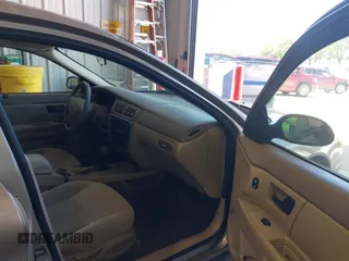 2003 Ford Taurus SE Standard with VIN 1FAFP53U13G229161, listed as a IAAI auction lot 39753697 with 94,195 mi miles. Bid and sale history available at carsss.com. Image 5.