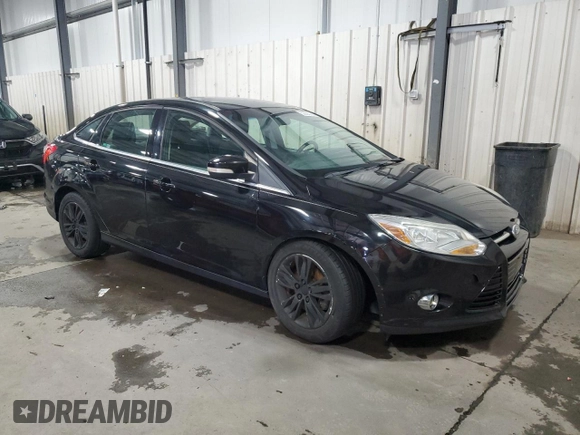 2012 Ford Focus SEL with VIN 1FAHP3H28CL243117, listed as a Copart auction lot 52923335 with 152,319 mi miles and Salvage Title. Bid and sale history available at carsss.com. Image 4.