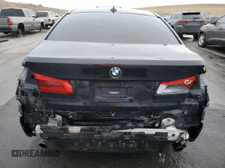 2018 BMW 5 Series 530e xDrive with VIN WBAJB1C5XJB084018, listed as a Copart auction lot 86277124 with 127,517 mi miles and Salvage Title. Bid and sale history available at carsss.com. Image 6.