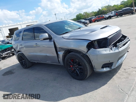 2018 Dodge Durango SRT with VIN 1C4SDJGJ6JC366644, listed as a IAAI auction lot 41906182 with 54,490 mi miles and . Bid and sale history available at DreamBid. Image 13.