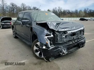 2022 Ford F-150 Lightning Pro z VIN 1FT6W1EV7NWG10601, wystawiony jako Copart lot #55057445 z przebiegiem Nie podano mil oraz Szkoda całkowita • Salvage title. Historia ofert i sprzedaży dostępna na DreamBid. Obrazek 13.