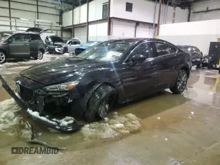 2021 Mazda Mazda6 Touring with VIN JM1GL1VM1M1604650, listed as a Copart auction lot 87464764 with 77,564 mi miles and Salvage Title. Bid and sale history available at carsss.com. Image 1.