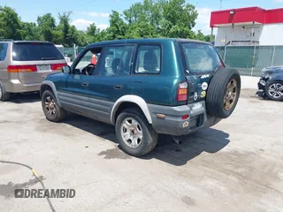 1998 Toyota RAV4 with VIN JT3GP10V6W0023680, listed as a IAAI auction lot 42235877 with 244,446 mi miles and . Bid and sale history available at DreamBid. Image 3.