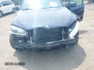 2017 BMW X5 xDrive50i with VIN 5UXKR6C5XH0J84270, listed as a IAAI auction lot 42437301 with 92,847 mi miles and . Bid and sale history available at DreamBid. Image 6.