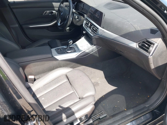 2021 BMW 3 Series 330i with VIN 3MW5R1J09M8B93600, listed as a IAAI auction lot 41735270 with 77,648 mi miles. Bid and sale history available at carsss.com. Image 5.