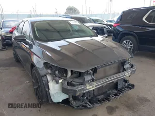 2017 Ford Fusion SE z VIN 3FA6P0HDXHR242034, wystawiony jako IAAI lot #42356463 z przebiegiem 65 584 mil mil oraz . Historia ofert i sprzedaży dostępna na DreamBid. Obrazek 1.