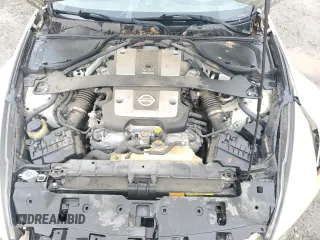2012 Nissan 370Z z VIN JN1AZ4EHXCM562486, wystawiony jako Copart lot #44594005 z przebiegiem 79 150 mil mil oraz Szkoda całkowita • Salvage title. Historia ofert i sprzedaży dostępna na DreamBid. Obrazek 11.