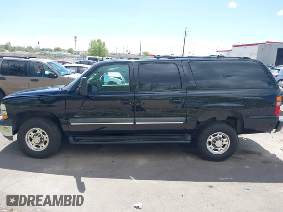2003 Chevrolet Suburban LT z VIN 3GNGC26G83G210035, wystawiony jako IAAI lot #42084859 z przebiegiem 145 919 mil mil oraz . Historia ofert i sprzedaży dostępna na DreamBid. Obrazek 14.