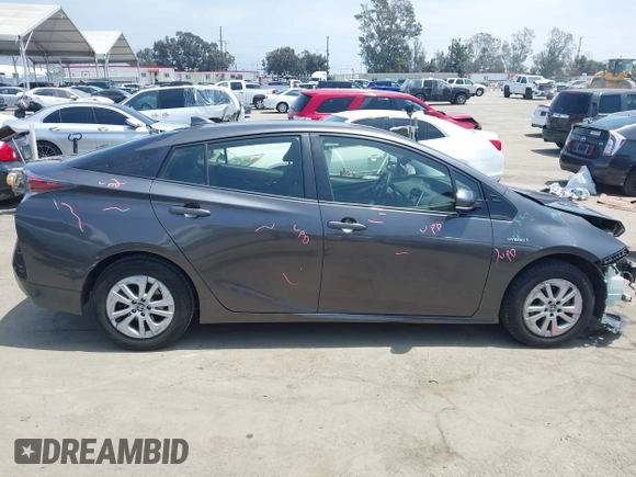 2017 Toyota Prius Two with VIN JTDKBRFU7H3570136, listed as a IAAI auction lot 42183403 with 112,828 mi miles and . Bid and sale history available at DreamBid. Image 14.