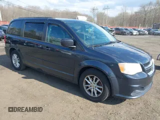 2013 Dodge Grand Caravan SXT with VIN 2C4RDGCG2DR652708, listed as a IAAI auction lot 42043026 with 245,442 mi miles and . Bid and sale history available at DreamBid. Image 1.