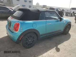 2018 MINI Convertible Cooper with VIN WMWWG5C5XJ3D00672, listed as a Copart auction lot 45905045 with 73,554 mi miles and Salvage Title. Bid and sale history available at DreamBid. Image 3.