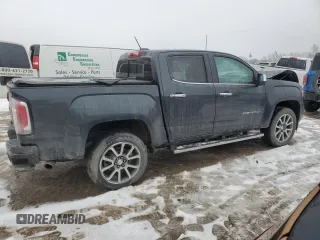 2021 GMC Canyon 4WD Denali with VIN 1GTG6EENXM1199427, listed as a Copart auction lot 86018624 with 98,520 mi miles and Salvage Title. Bid and sale history available at carsss.com. Image 3.