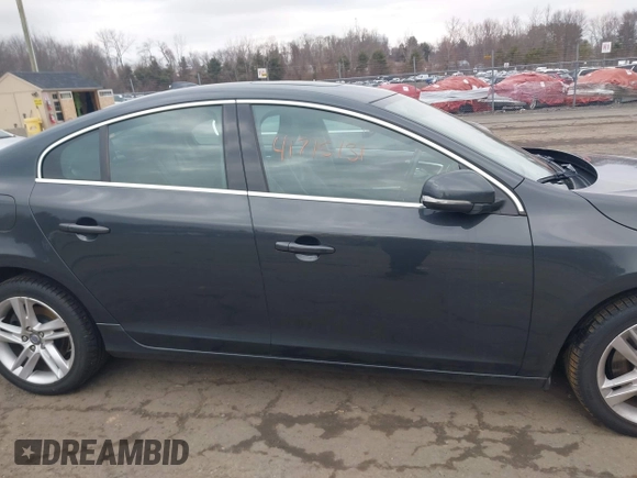 2015 Volvo S60 T5 Platinum with VIN YV1612TDXF1317203, listed as a IAAI auction lot 41715131 with 142,632 mi miles. Bid and sale history available at carsss.com. Image 13.